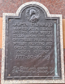 Image of a wall plaque in Warrington, UK, commemorating the place where John Howard lived whist printing his magnum opus on prison reform in 1777.